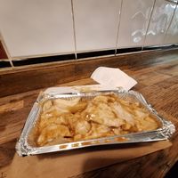Curry cheese chips at McGuinness - Takeaway in Dublin
