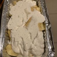 Garlic cheese chips   at McGuinness - Takeaway in Dublin