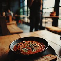 Curried chickpea stew & sourdough bread, epic food and wicked vibes 💚✌️ at MOTHER - Juice Works in East London