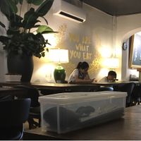 waiters on their phones while I was waiting for my binl at Pinxin Vegan Cuisine - 品馨蔬食 in Penang