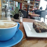 Sweet potato brownie and flat white W/ soy at Cat Cuddle Cafe in Lutwyche