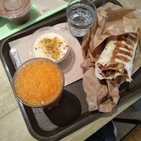 Farmer wrap, carrot ginger fresh pressed juice and Libanaise flan   at SAMAM - Cantine végétale in Paris