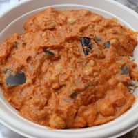 Eggplant & chickpea ragout with cashew cream over brown rice. at Greens and Grains in Galloway