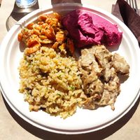 Up: carrot with mustard and beetroot hummus. Down: rice with mushrooms and seitan at Veg Eat in Bergamo