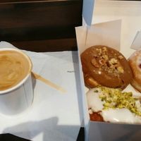 coffee with almond milk and a box of vegan donuts at The Rolling Donut - Bachelors Walk in Dublin
