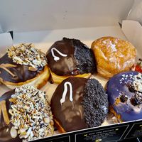 From left: peanut butter cup, cookies and cream, strawberry eton mess and blueberry crumble   at The Rolling Donut - Bachelors Walk in Dublin