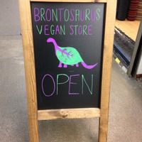 Outside sign at Brontosaurus Vegan Lifestyle Store in Swansea