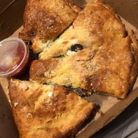 Veggie calzone (Spinach, mushrooms, Roma tomatoes, seasoned ricotta, mozzarella, provolone and black olives) at Mellow Mushroom - Downtown in Montgomery