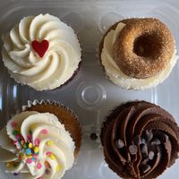 Red velvet, cinnamon donut, vanilla birthday cake, chocolate chip at Two Birds Baking Company in Fullerton
