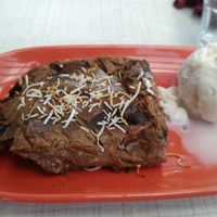 Goodness bar - chocolatey coconutty and nutty mixture, with coconut ice cream at Abracadabra Cafe & Bar in Rotorua