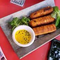 Palitos de queso vegano con mix de hummus at Sanissimo - Principe Pio in Madrid