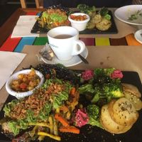 Lasaña berenjena, eggplant lasagna, with veggies, potatoes and chickpeas. Grrat presentation, very colorful at Sanissimo - Principe Pio in Madrid