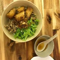 Rice noodles with fried spring rolls (30k dongs), not the best choice at Vegan Family Restaurant in Ho Chi Minh City