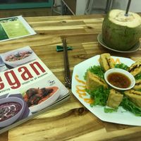 Crispy tofu and fresh coconut at Vegan Family Restaurant in Ho Chi Minh City