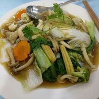 Fried noodles with vegetables and mushrooms at Vegan Family Restaurant in Ho Chi Minh City