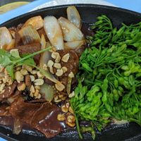 Vegan beef - so delicious, definitely try this. It comes with rice noodles on the side. at Vegan Family Restaurant in Ho Chi Minh City