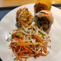 Vegan sushi and salad from the buffet at Veganio in Prague