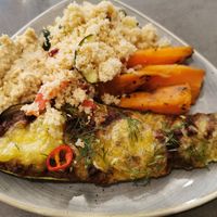 Meal of the day with filled zucchini, sweet potatoes, couscous and hummus at Nordvegan in Oslo