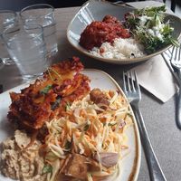 Vegan lasagne with salads. Curry in background. at Nordvegan in Oslo