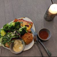 Lasagne, macaroni bomb, spring roll, cold salad, broccoli, sauces at Nordvegan in Oslo
