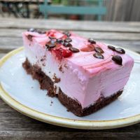 Strawberry cake - mousse-like top, delicious chocolate base. Perfect on a warm summer’s evening! at Nordvegan in Oslo