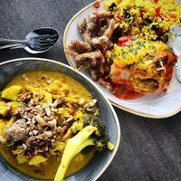 Enchilada combo & Thai yellow curry. See the giant hunk of undercooked broccoli I was talking about - too difficult to eat haha. Recommend the enchilada though. at Nordvegan in Oslo