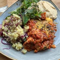 Lasagne with salad and hummus  at Nordvegan in Oslo