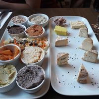 Cheese plate & various tapas (hummus, kimchi, tapenade, etc.) at Le Faitout Vegan in Paris