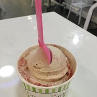 Coconut base ice cream, Cookie Butter flavor, with Strawberry Sundae sauce topping at Creamistry in Scottsdale