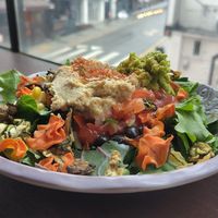 Hummus Burrito Bowl & view of the street at Fat Cat Neighborhood Bistro - 팻캣 in Seoul