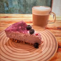 Raw cheesecake with cappuccino at Aura Vegana in Mexico City