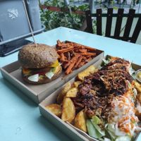 Spicy cheeze burger w/ sweet potato fries, "pulled pork" plate at Las Vegan's - Kazinczy Trailer in Budapest