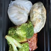 Mushrooms dumplings, veggie dumplings, and general tso left overs.  at Ginger Root in New York City