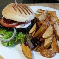 Vegan 'fish' burger with wedges at Holy Cow in Edinburgh