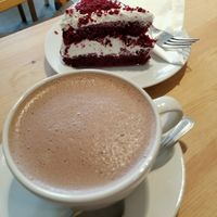 Vegan red velvet cake and hot chocolate! at Holy Cow in Edinburgh