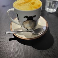 Turmeric Latte (oat milk) and Pulled Jackfruit Burger at Holy Cow in Edinburgh