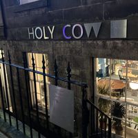 Easy to miss - the entrance is down some stairs and is in a basement shop.  at Holy Cow in Edinburgh