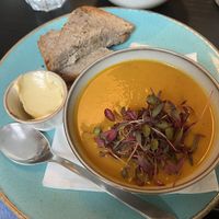 Carrot and coriander soup and homemade buckwheat bread  at Holy Cow in Edinburgh