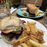 in the front the vietnamese style tofu burger and in the back oyster mushroom burger   at Holy Cow in Edinburgh