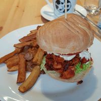 Pulled Jackfruit burger with chips and an oat milk latte   at Holy Cow in Edinburgh