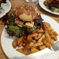 Tofu burgers and amazing chips. Delicious homemade bread... amazing selection of vegan cakes too! at Holy Cow in Edinburgh