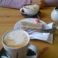 Chai latte, almond cappuccino and vanilla velvet cake at Holy Cow in Edinburgh