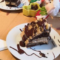 Chocolate peanut butter cake. Huge portion. Delicious.  at Holy Cow in Edinburgh