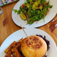 Burger and avocado sandwich under the rocket  at Holy Cow in Edinburgh