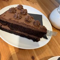 Chocolate cake - not great though - icing is waxy at Holy Cow in Edinburgh