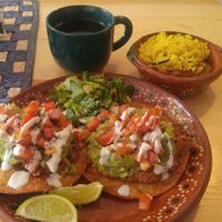 Guacamole Tostadas with a coffee at Tumerico in Tucson