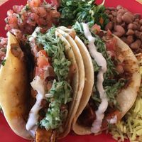 One mole taco, one chile negro taco at Tumerico in Tucson