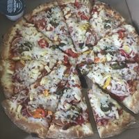 Spicy Hawaiian (large), looked better and tasted better than the photo 😅  at Panago Pizza in Prince Rupert