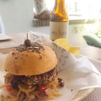 Hamburguesa de lentejas y kombucha sevillana! at La Vegana in Sevilla