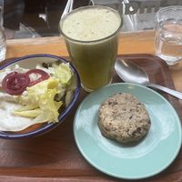 Small bowl (I’ve forgotten the name of it) , juice and cookie   at So Nat - Bourdaloue in Paris